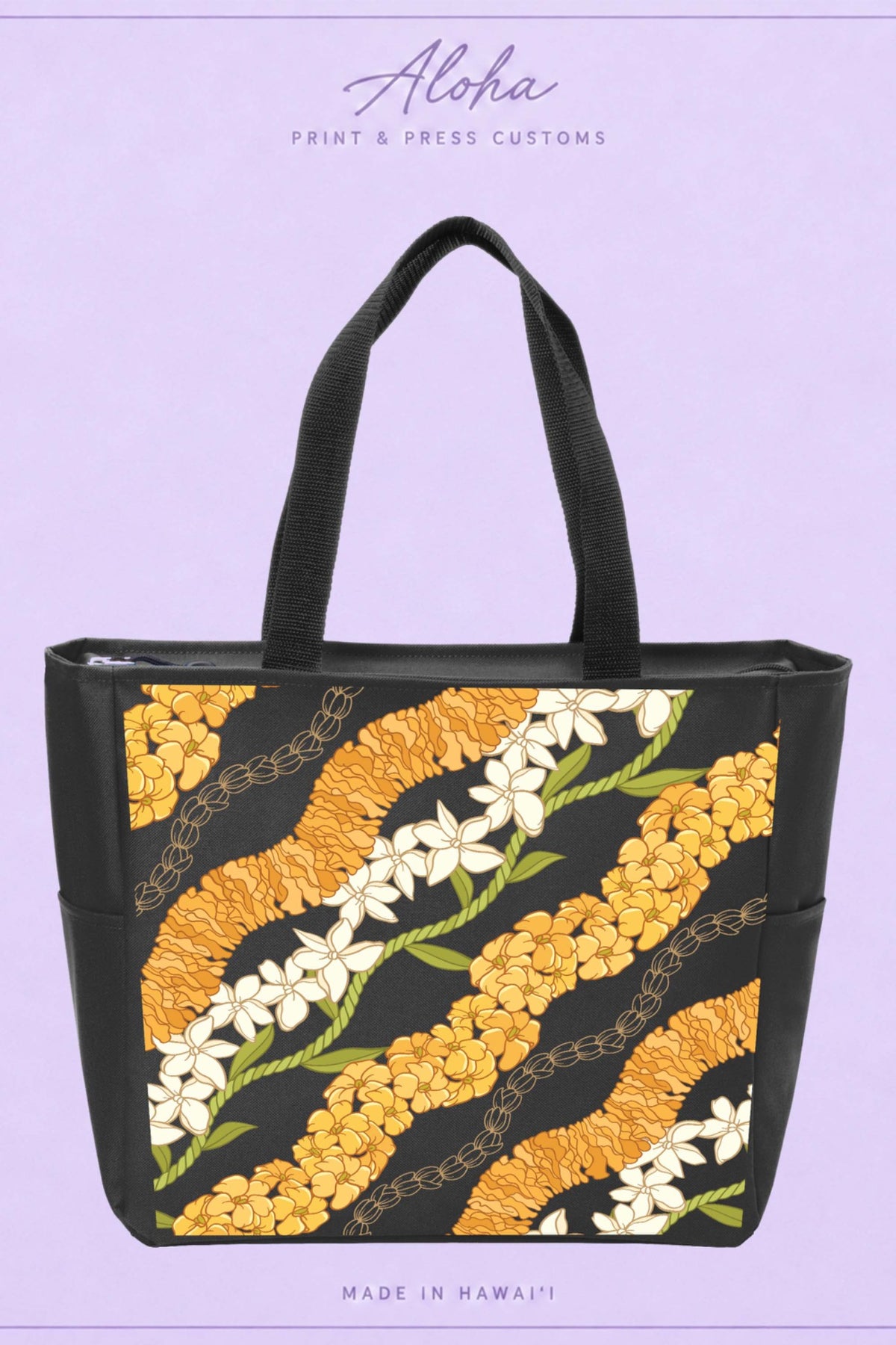 Black lei tote bag featuring ʻilima, puakenikeni, maile, pikake, and tiare flowers