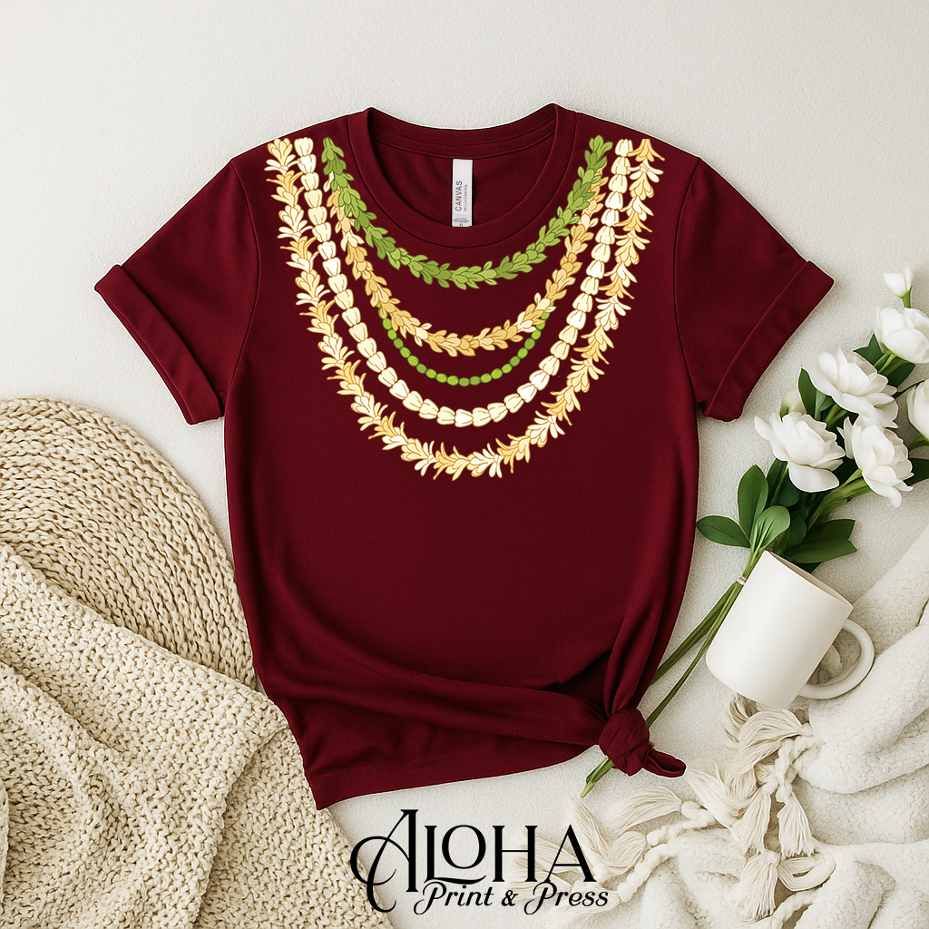 Maroon Hawaii graduation shirt featuring layered Pakalana Mokihana Crownflower lei design
