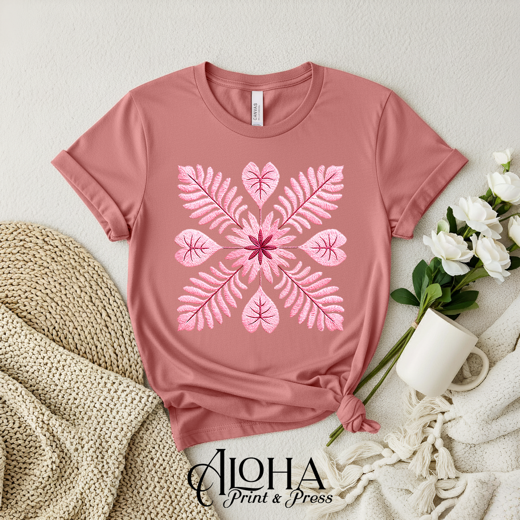 Blush botanical quilt block floral design on mauve shirt – soft feminine Hawaiian style tee
