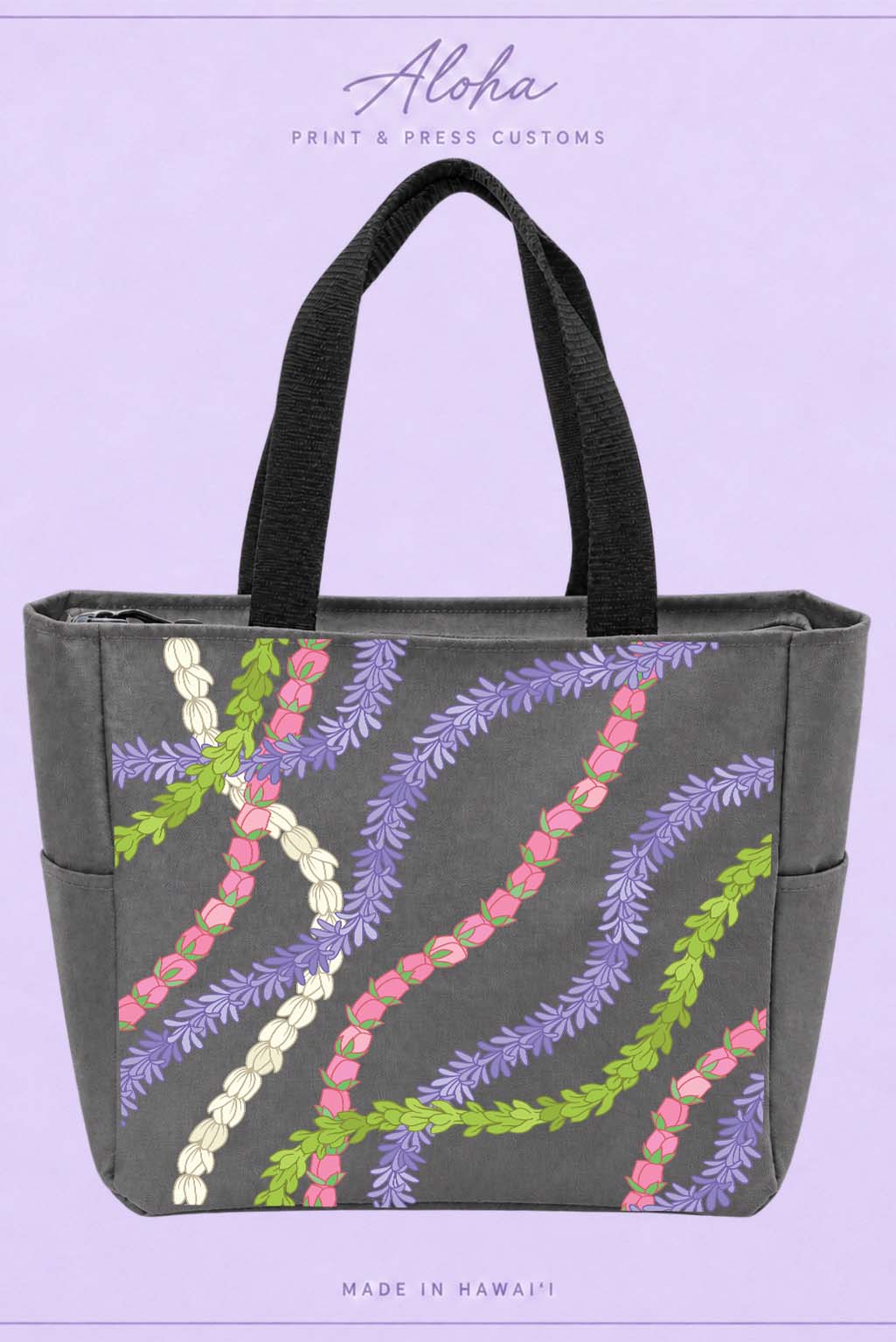 Dark charcoal Hawaiian lei tote bag with agapanthus, lokelani, pikake and pakalana floral design