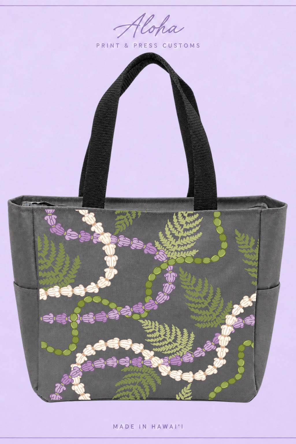 Dark charcoal Hawaiian lei tote with cornflower, mokihana, and palapalai design
