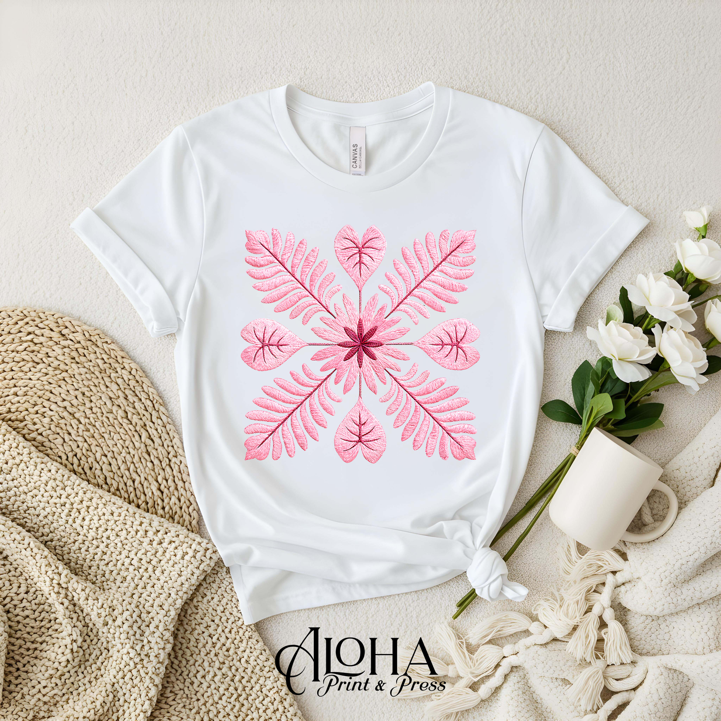 Blush botanical floral quilt block design on white shirt – modern Hawaiian inspired top