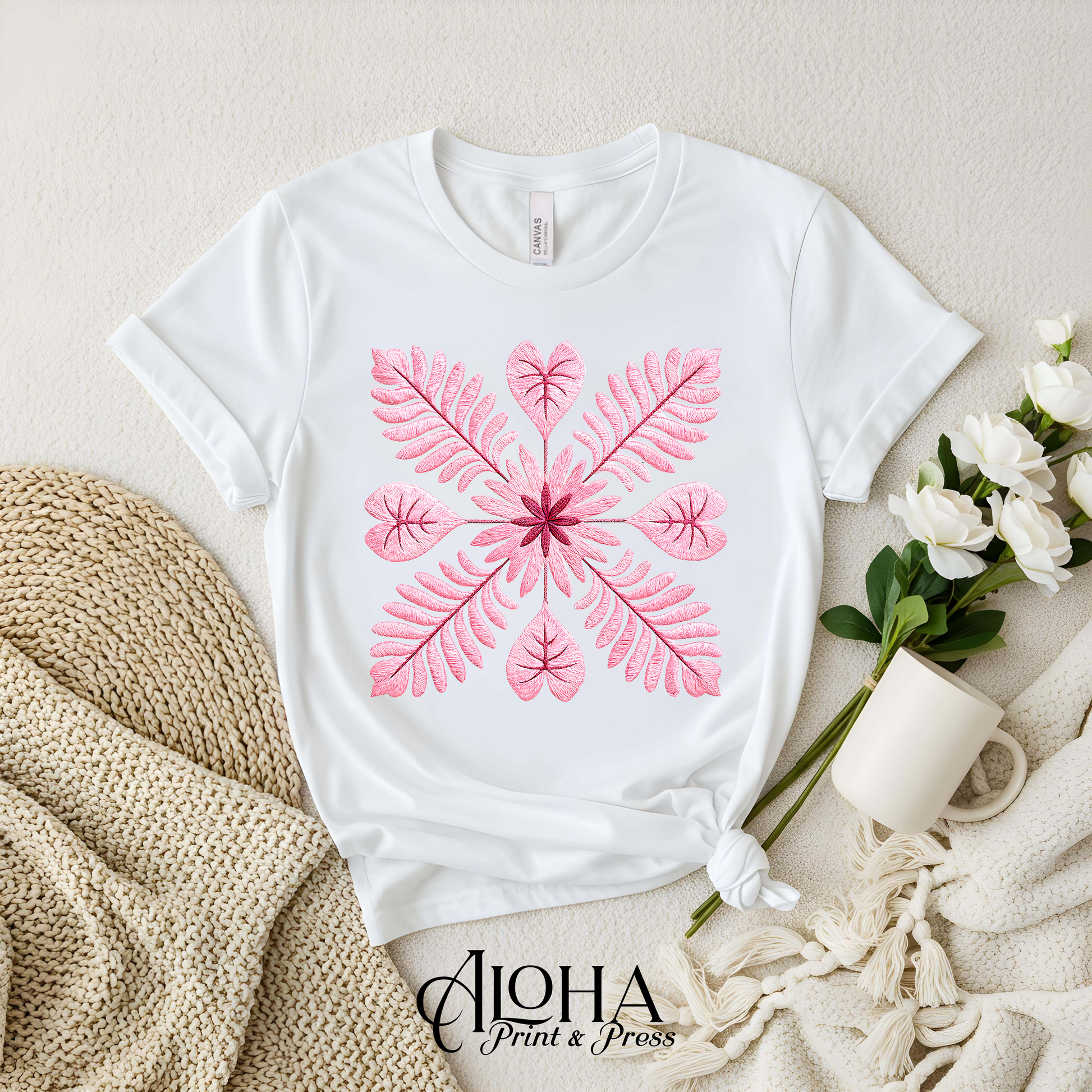 Blush botanical floral quilt block design on white shirt – modern Hawaiian inspired top