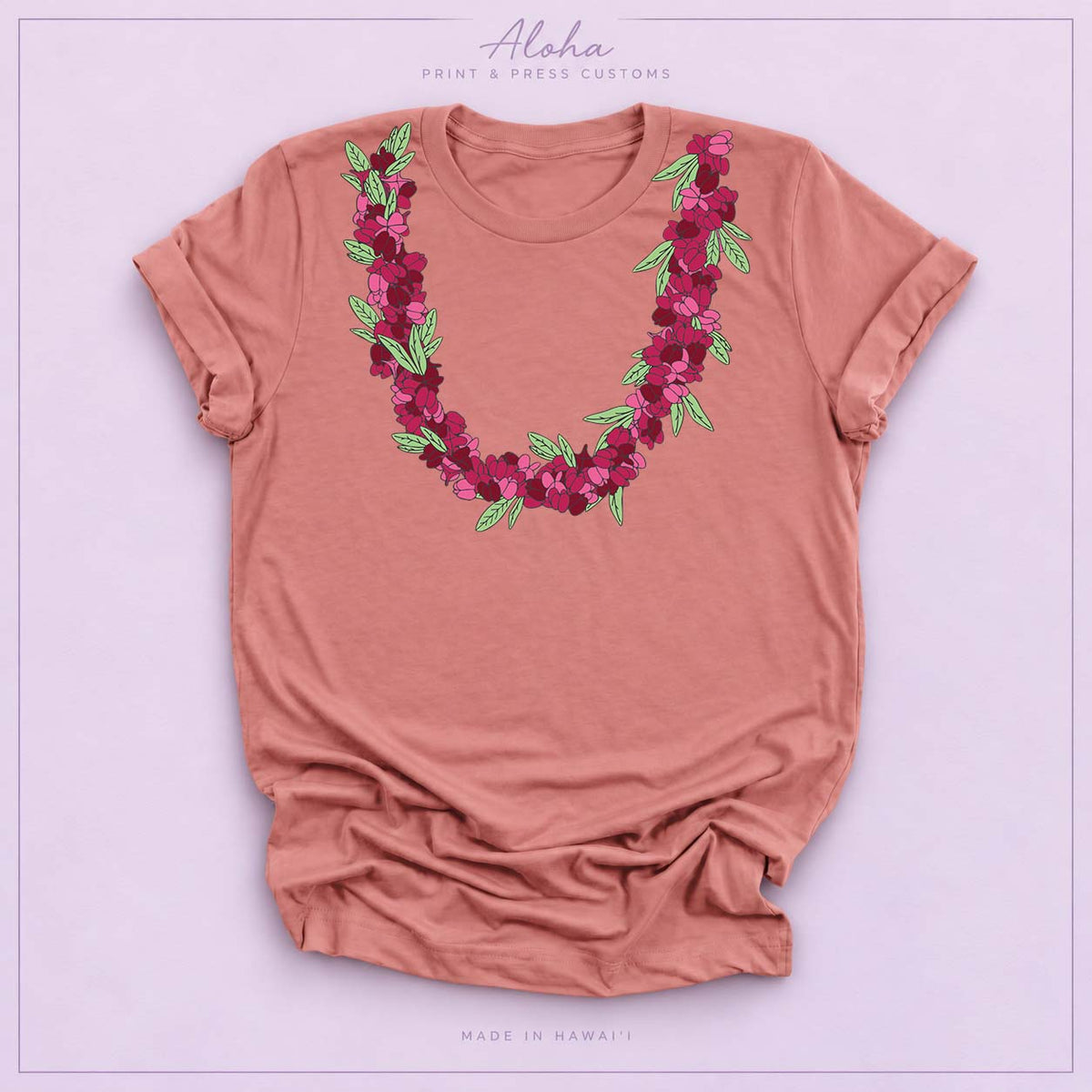 Mauve T-shirt featuring an ʻAʻaliʻi flower lei design