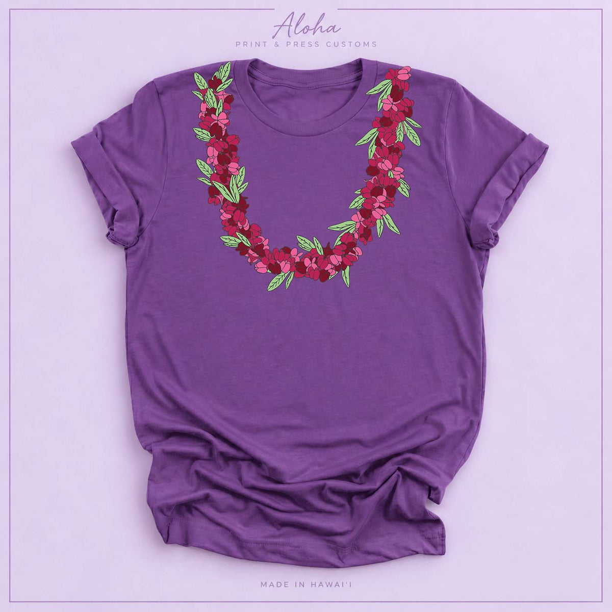 Royal purple T-shirt featuring an ʻAʻaliʻi flower lei design