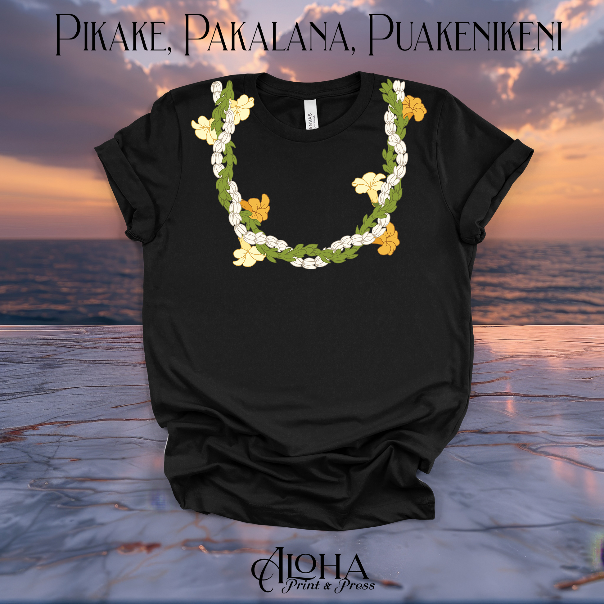 Black Bella Canvas 3001 t-shirt featuring a custom white Pikake, yellow Pakalana, and orange Puakenikeni lei print by Aloha Print and Press