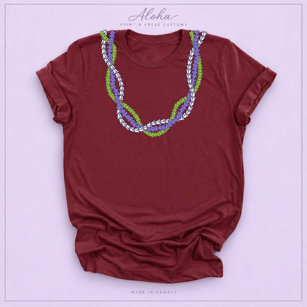 Maroon T-shirt featuring the Crownflower Twist lei design