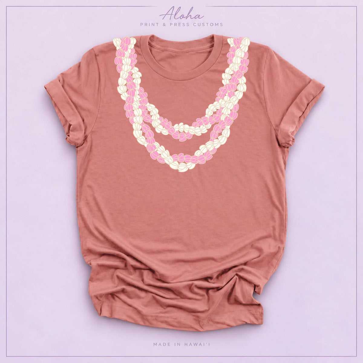 Mauve T-shirt with pink and cream Double Pikake Lei design on Aloha Print & Press Customs branded background