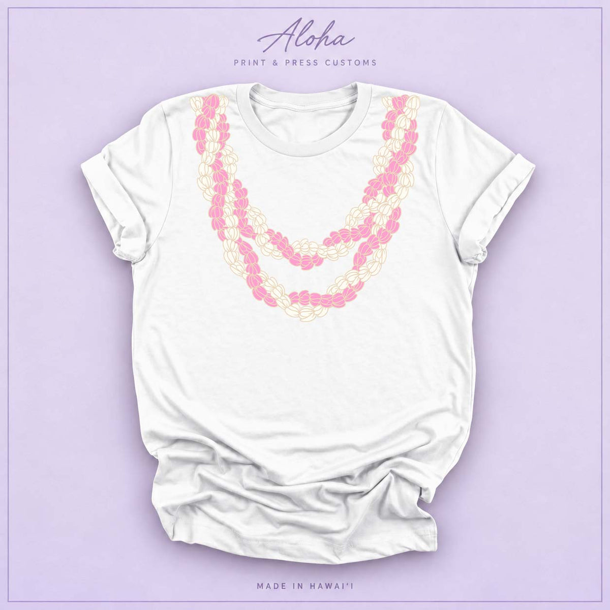 White T-shirt with pink and cream Double Pikake Lei design on Aloha Print & Press Customs branded background