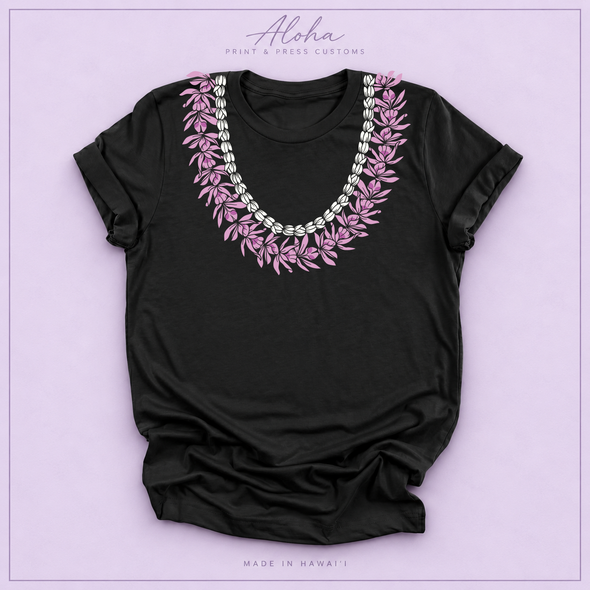 Black T-shirt with Honohono and Pikake Hawaiian lei design on Aloha Print & Press Customs branded background