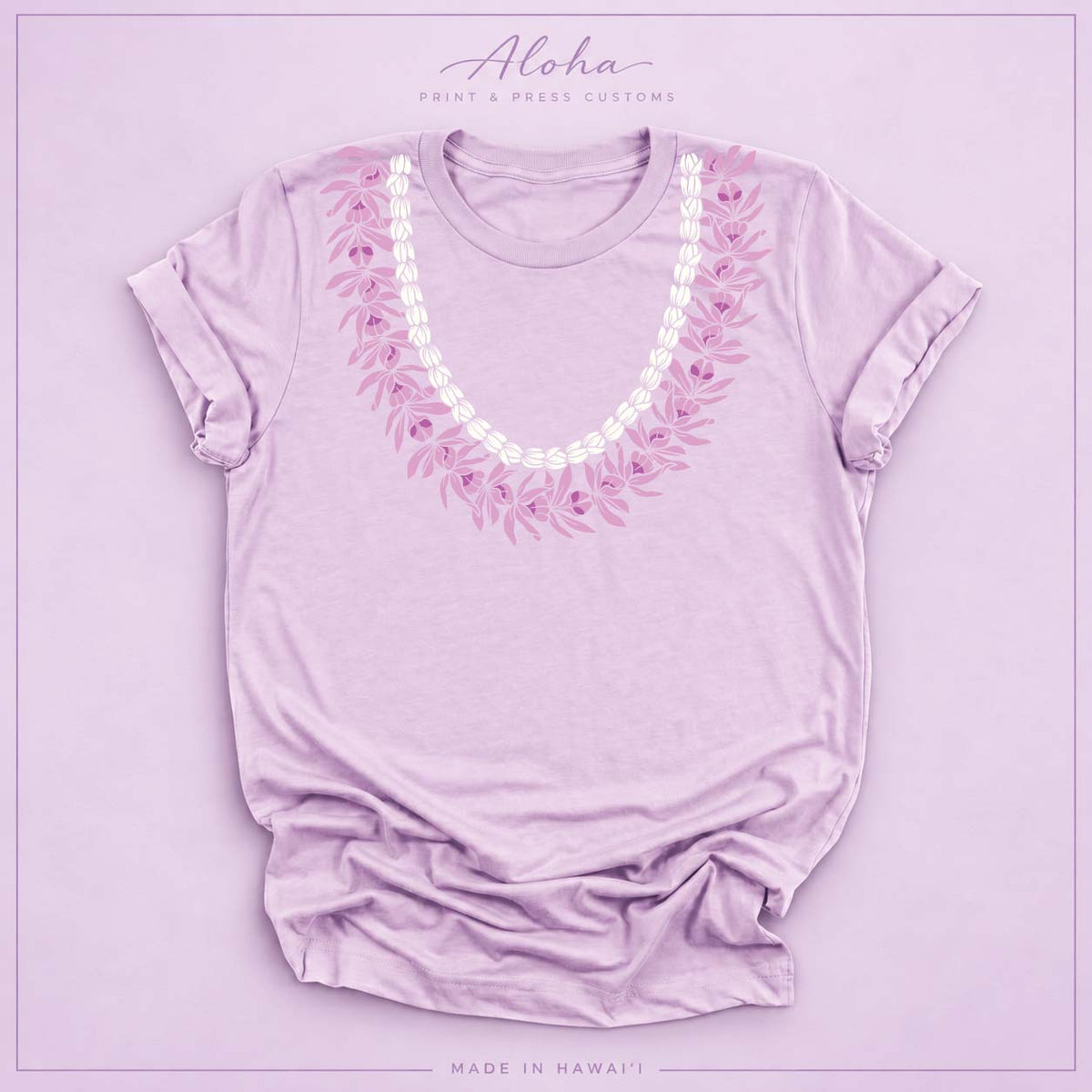 Lilac T-shirt with Honohono and Pikake Hawaiian lei design on Aloha Print & Press Customs branded background