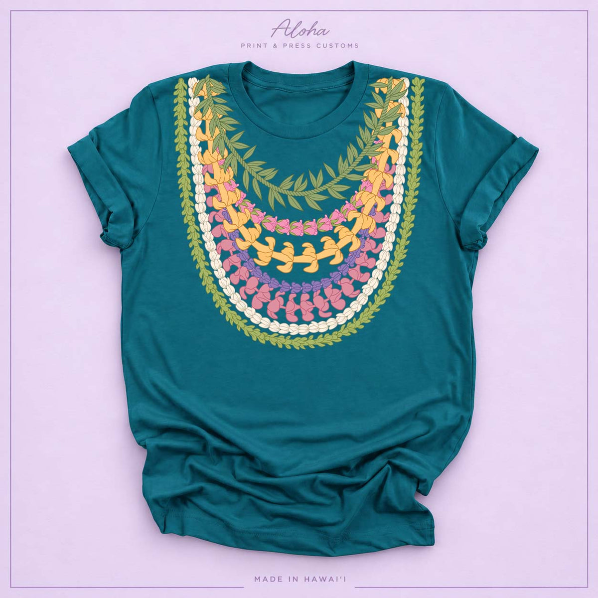 Deep teal T-shirt featuring Maile, Pikake, Crownflower, and Puakenikeni lei design