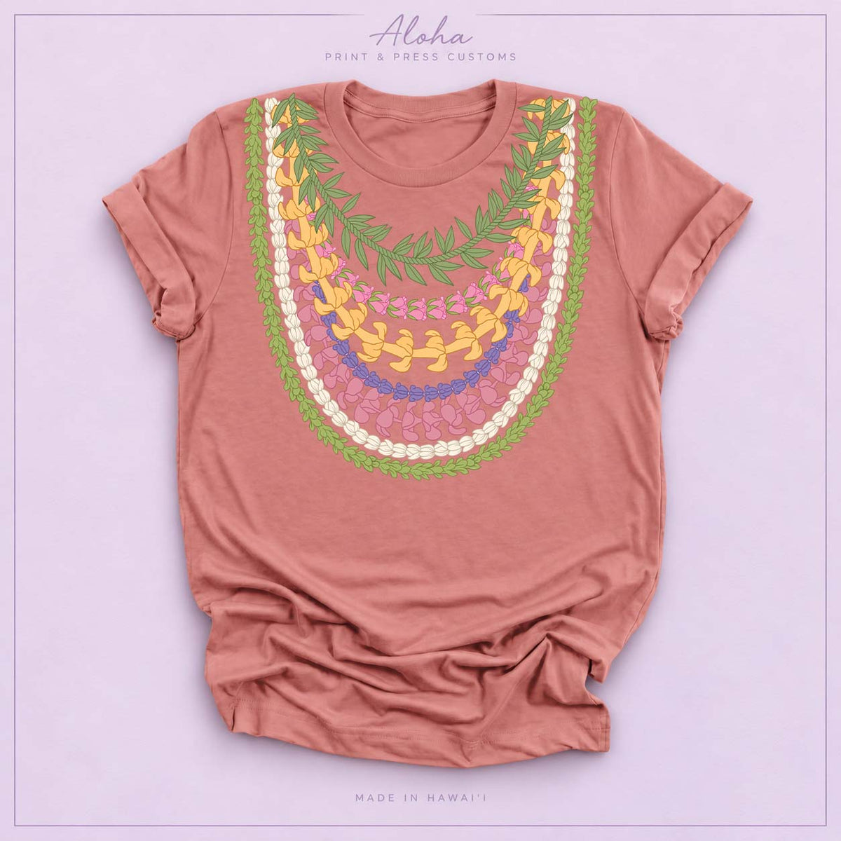 Mauve T-shirt featuring Maile, Pikake, Crownflower, and Puakenikeni lei design