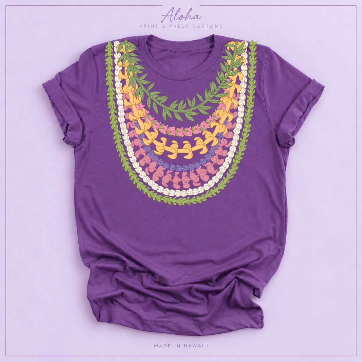 Royal purple T-shirt featuring Maile, Pikake, Crownflower, and Puakenikeni lei design