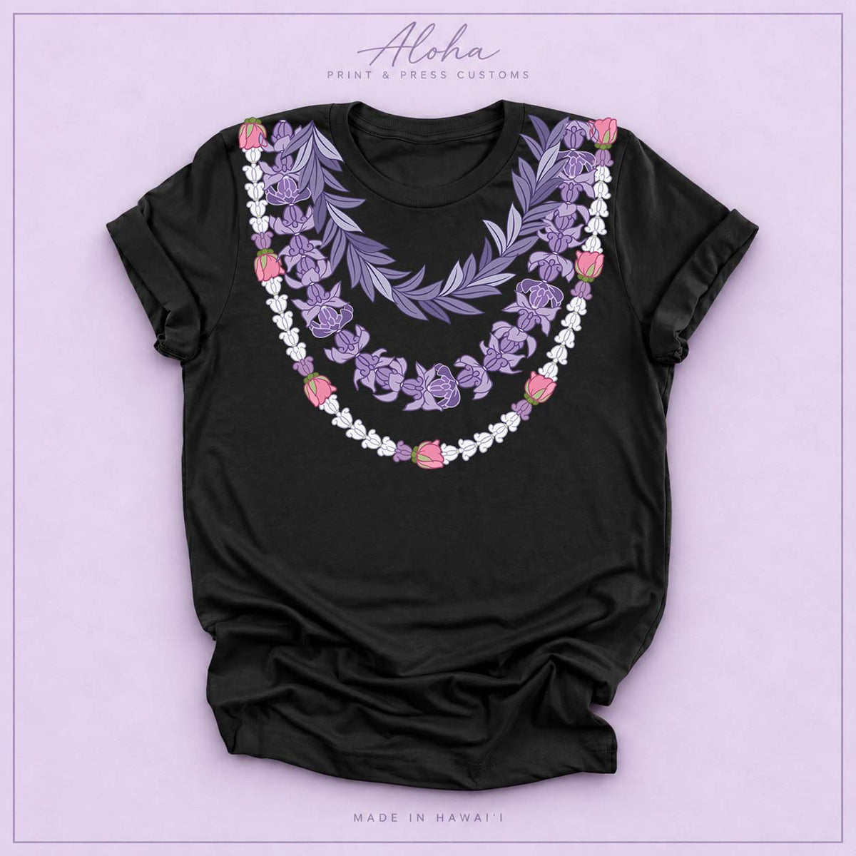 Black T-shirt featuring the Maile and Crownflower Triple Lei design