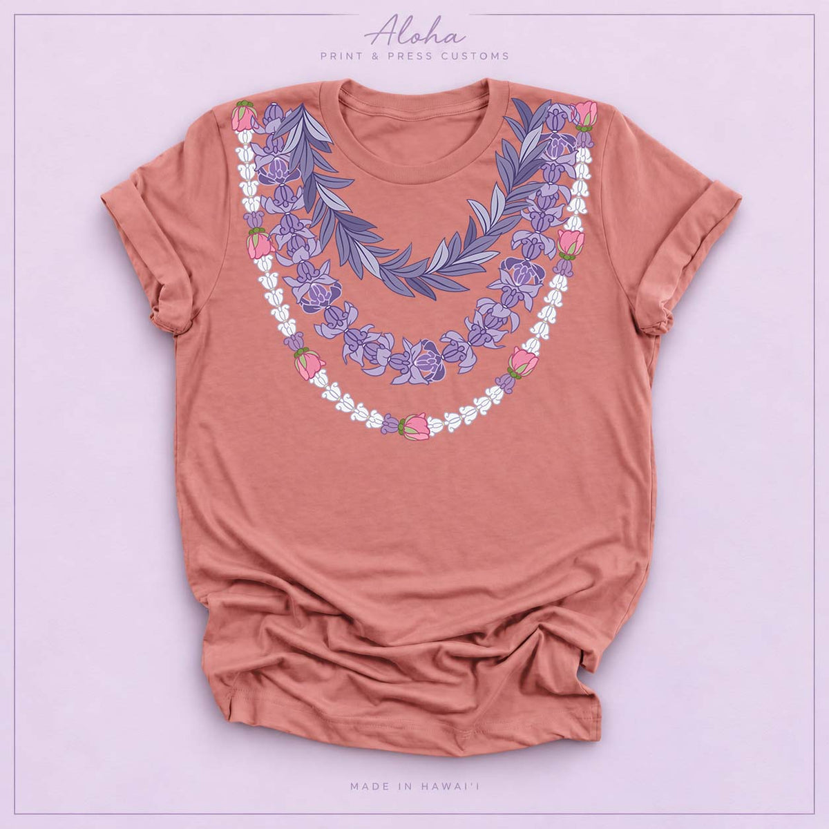 Mauve T-shirt featuring the Maile and Crownflower Triple Lei design