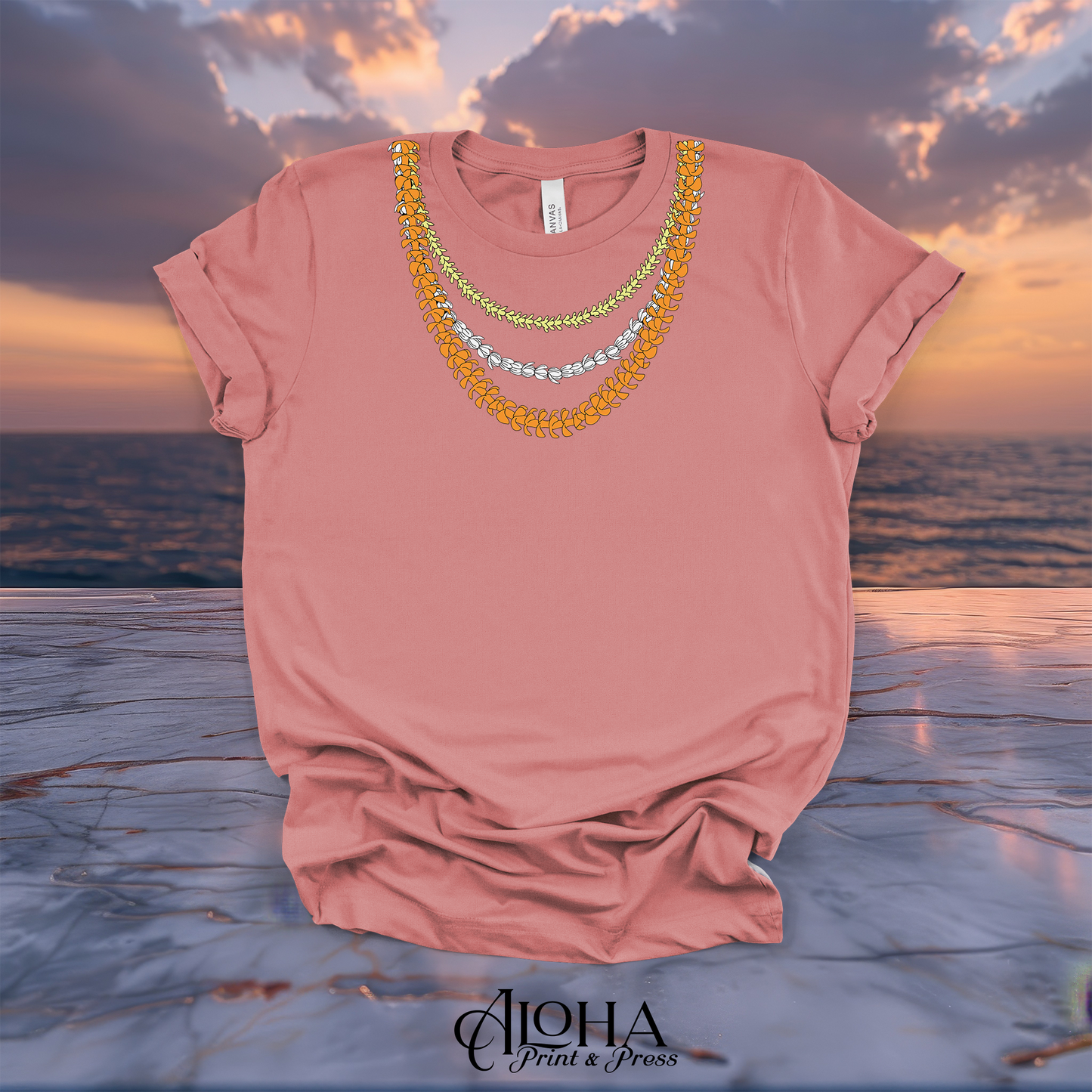 Mauve pink graphic t-shirt showcasing traditional Hawaiian Puakenikeni and Pikake lei strands.
