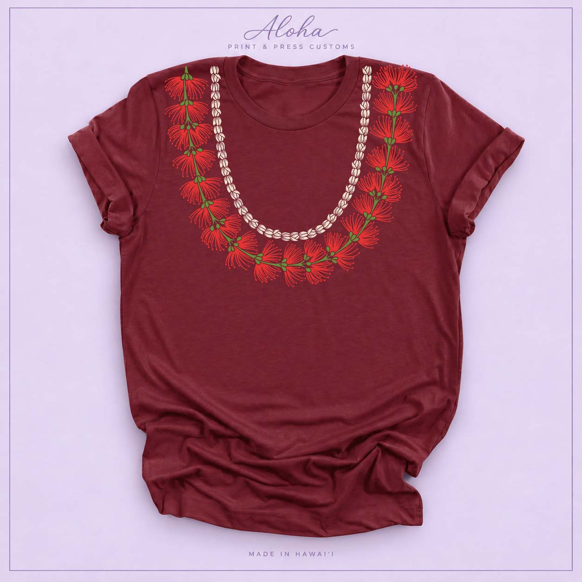 Maroon T-shirt featuring a ʻŌhiʻa Lehua and pikake lei design
