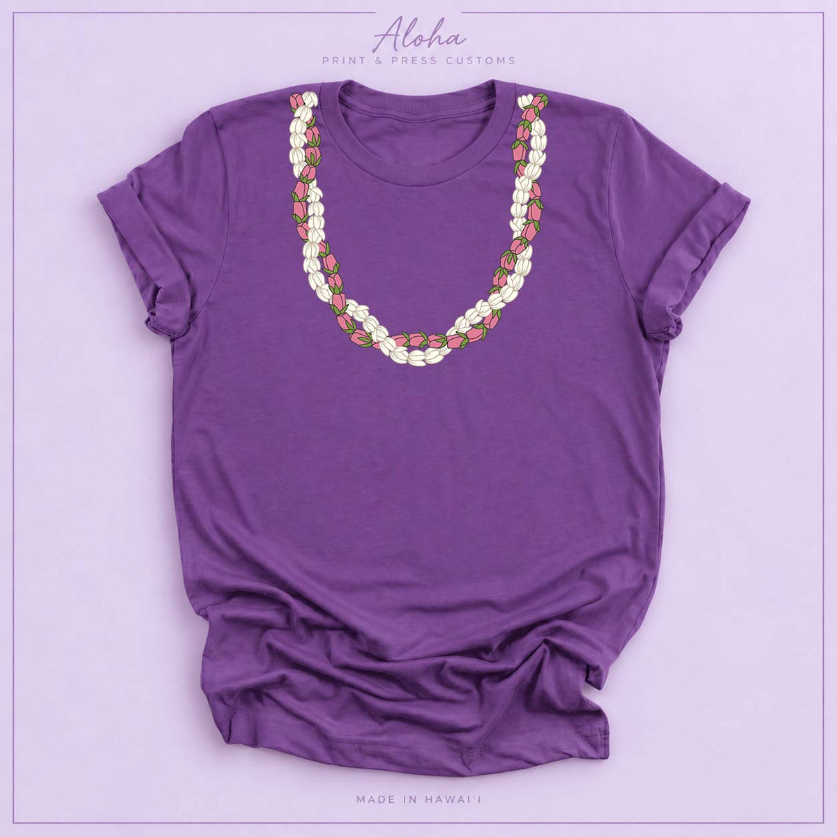 Royal purple T-shirt featuring a Pikake and Lokelani lei design on Aloha Print & Press Customs branded background