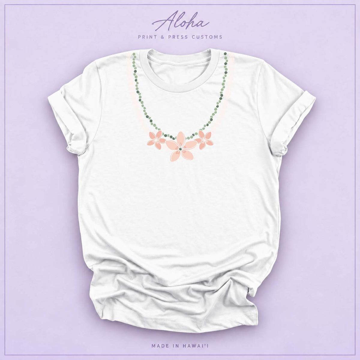 White T-shirt with Pikake Mokihana Plumeria Hawaiian lei necklace design on Aloha Print & Press Customs branded background