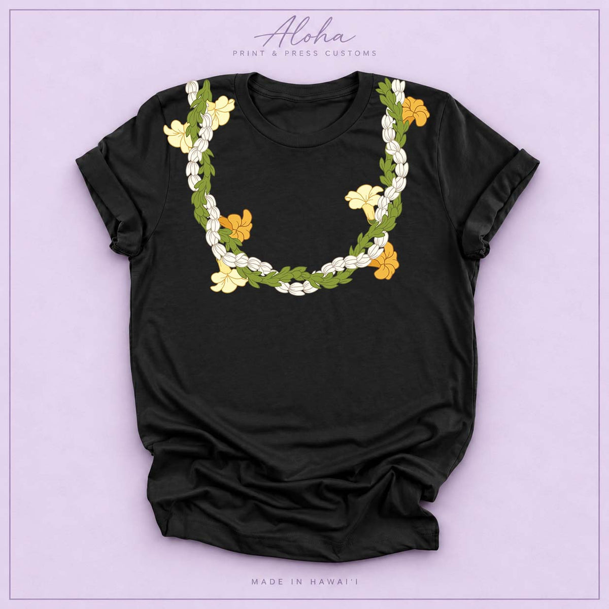 Black T-shirt with Pikake, Pakalana, and Puakenikeni lei design on Aloha Print & Press Customs branded background