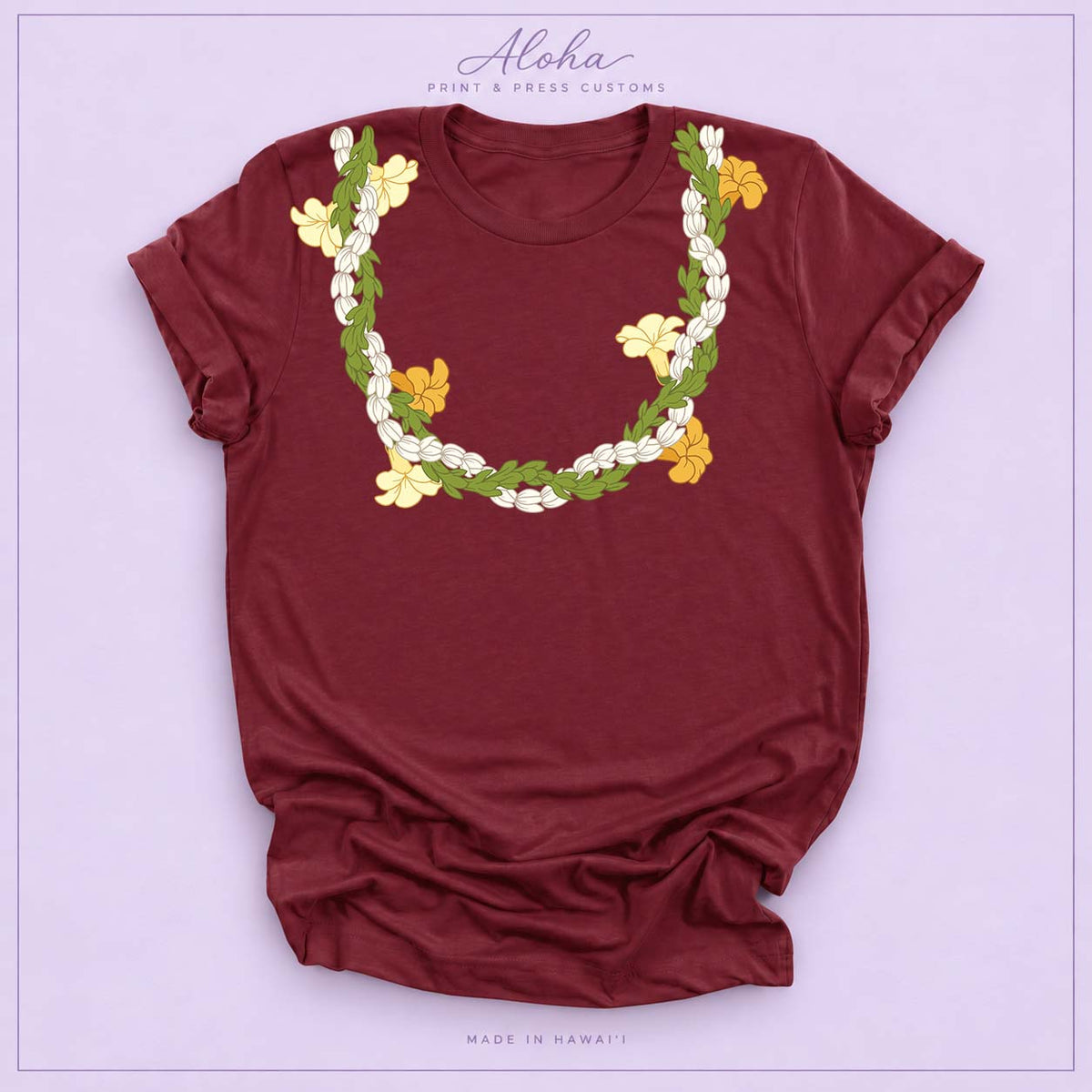 Maroon T-shirt with Pikake, Pakalana, and Puakenikeni lei design on Aloha Print & Press Customs branded background