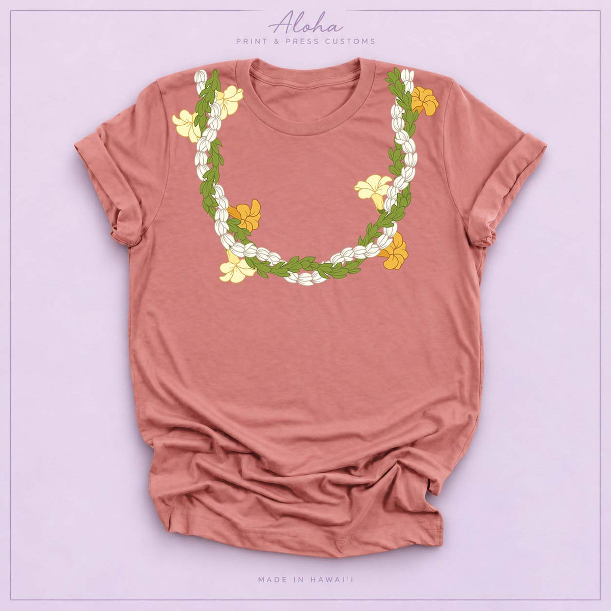 Mauve T-shirt with Pikake, Pakalana, and Puakenikeni lei design on Aloha Print & Press Customs branded background