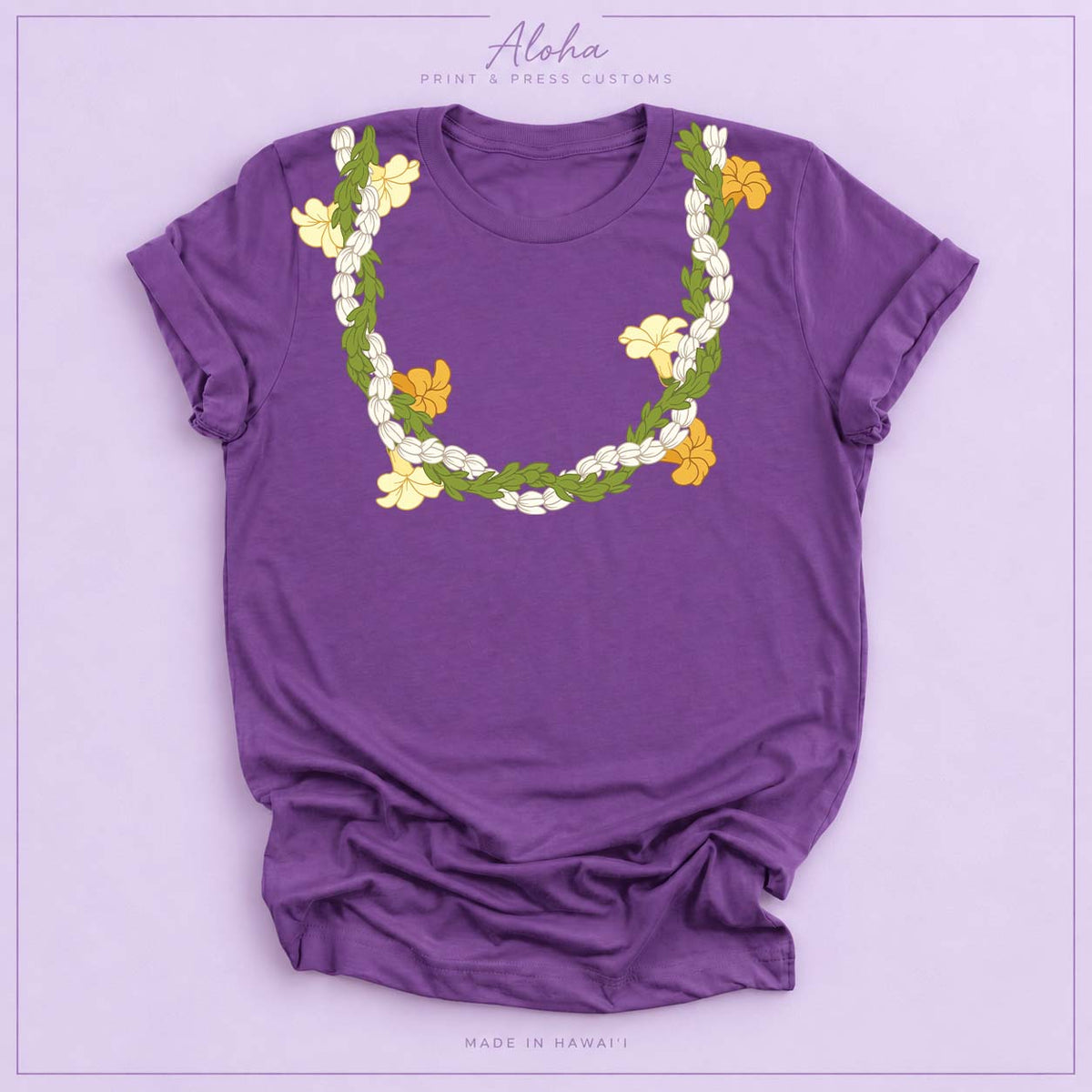 Royal purple T-shirt with Pikake, Pakalana, and Puakenikeni lei design on Aloha Print & Press Customs branded background