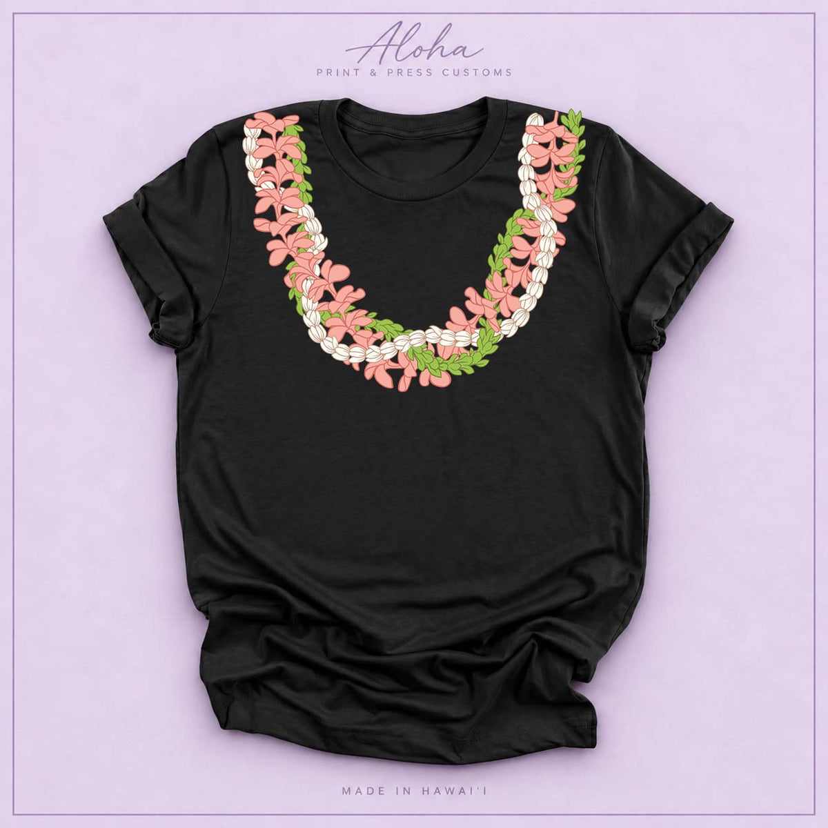 Black T-shirt featuring a Plumeria and Pikake lei design