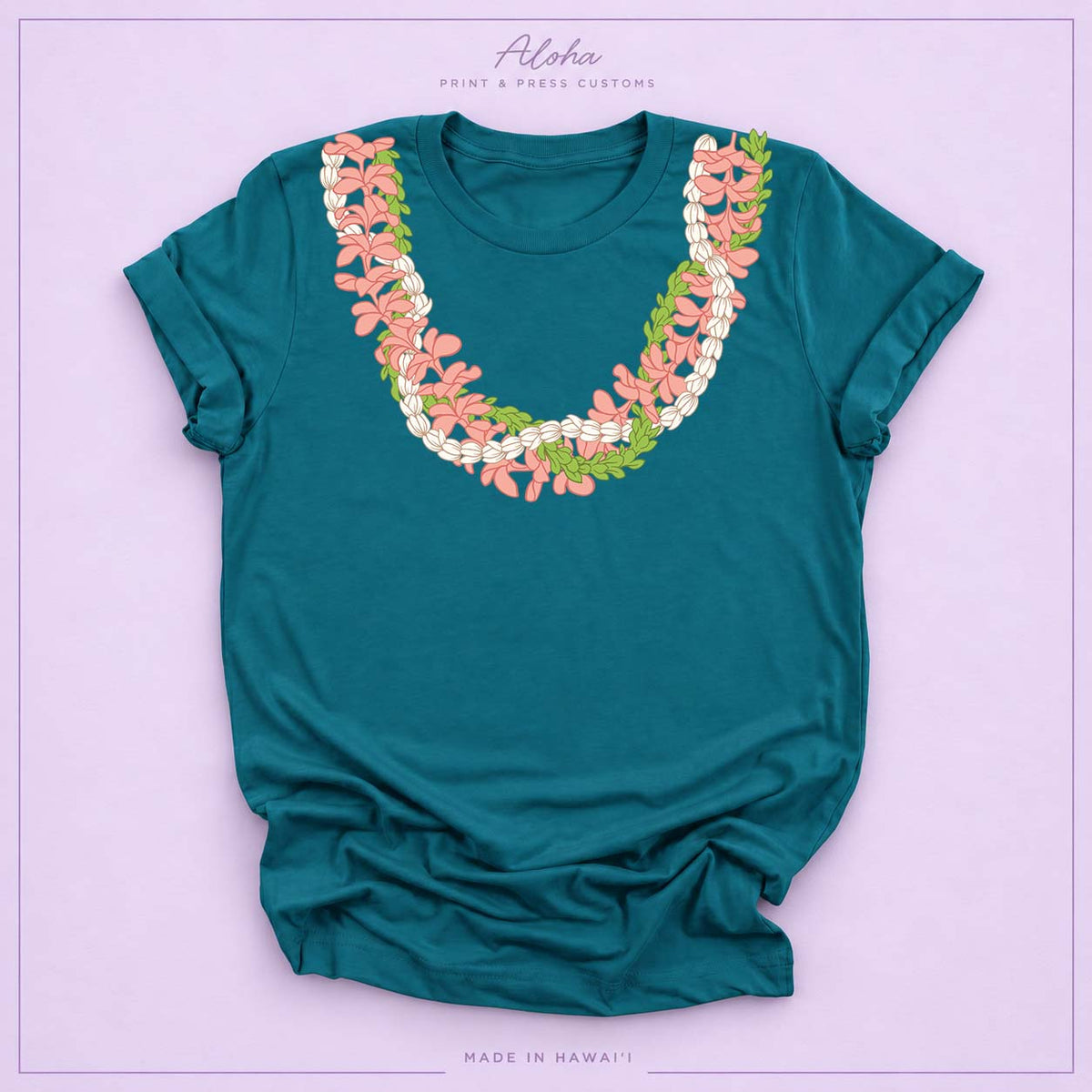 Deep teal T-shirt featuring a Plumeria and Pikake lei design