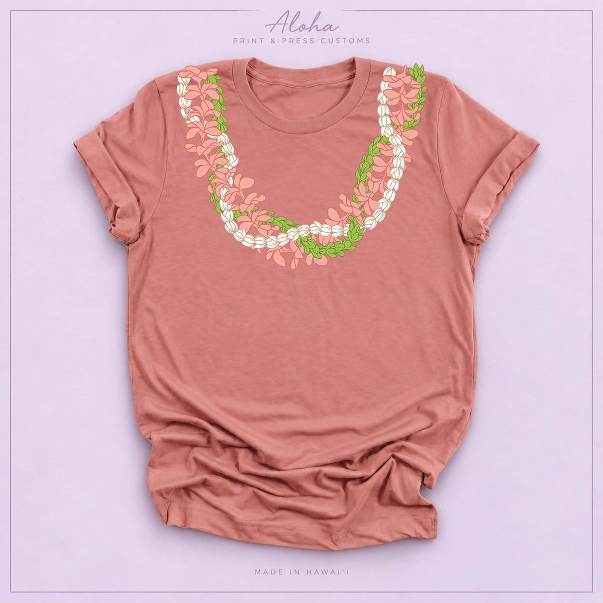 Mauve T-shirt featuring a Plumeria and Pikake lei design