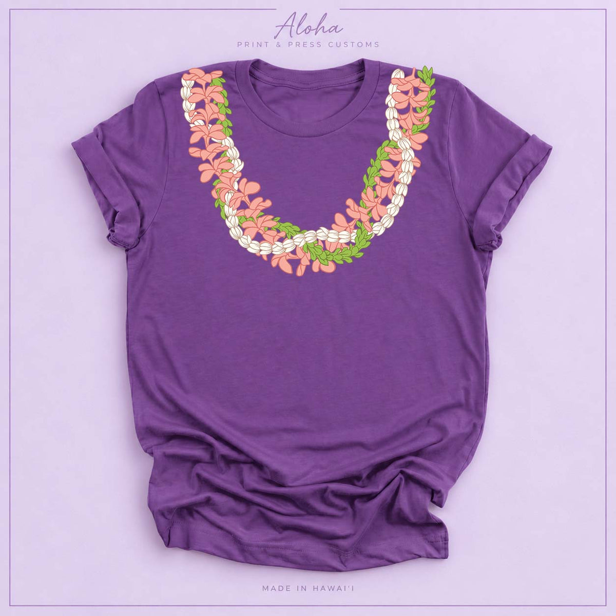 Royal purple T-shirt featuring a Plumeria and Pikake lei design