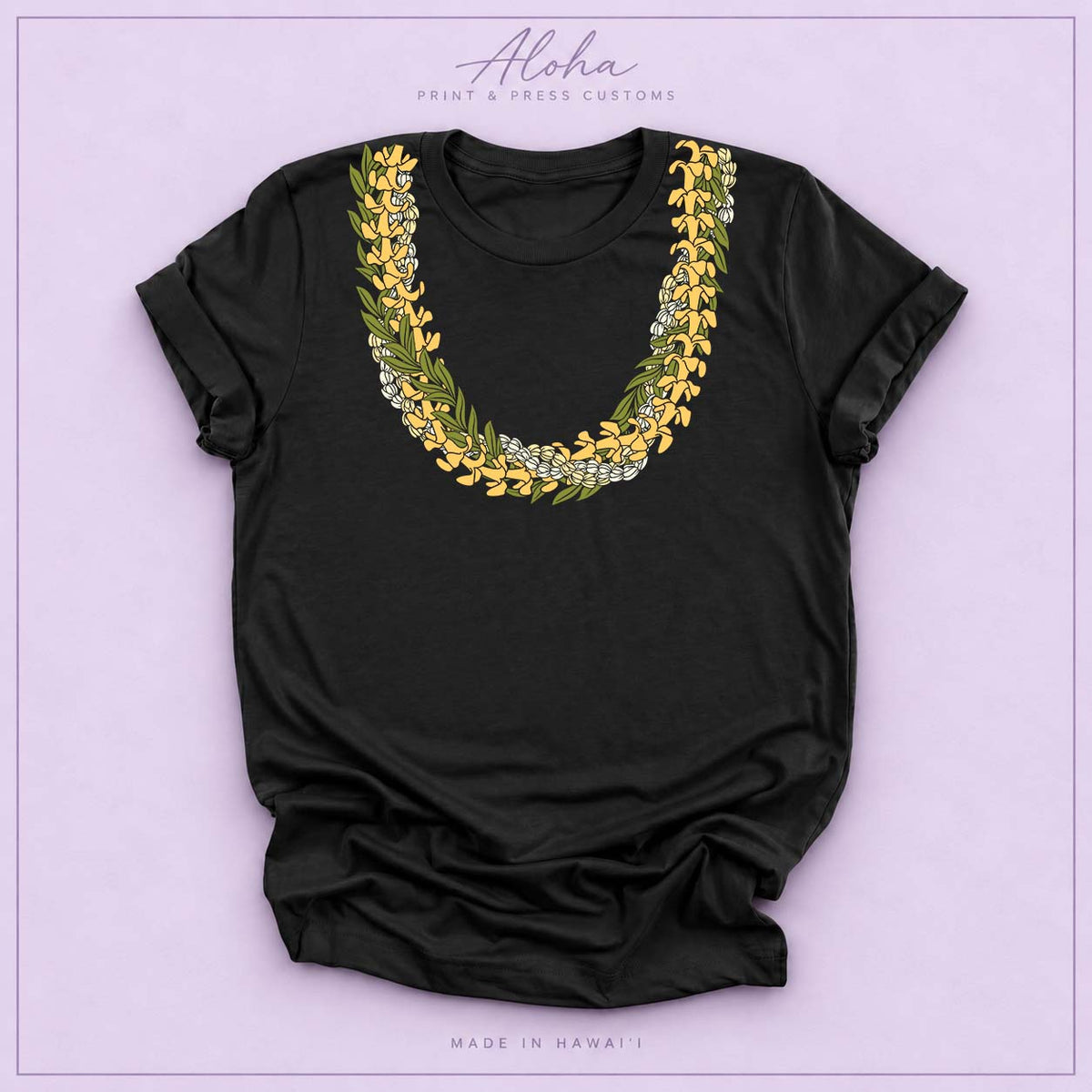 Black T-shirt with Puakenikeni, Maile, and Double Pikake lei design on Aloha Print & Press Customs branded background
