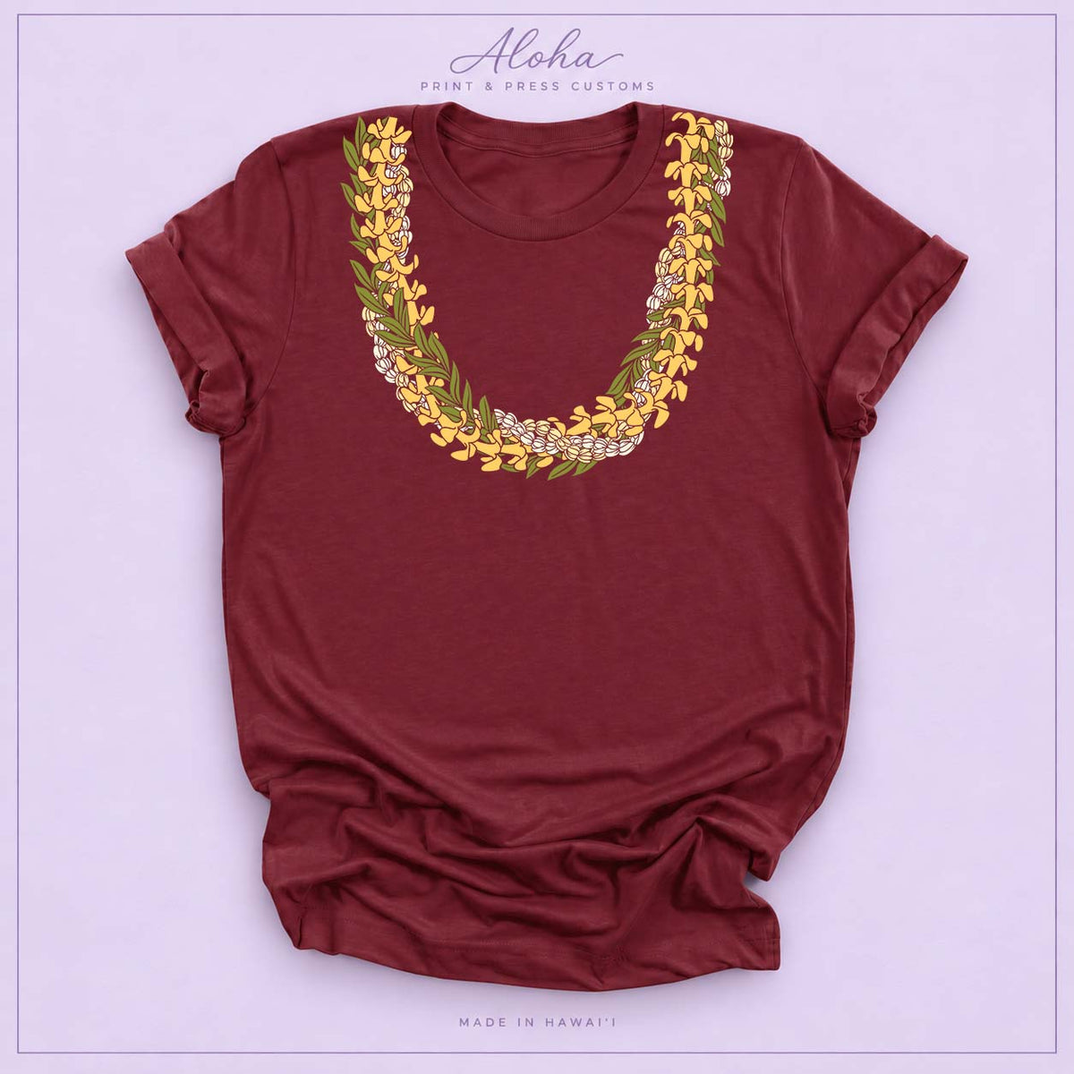Maroon T-shirt with Puakenikeni, Maile, and Double Pikake lei design on Aloha Print & Press Customs branded background