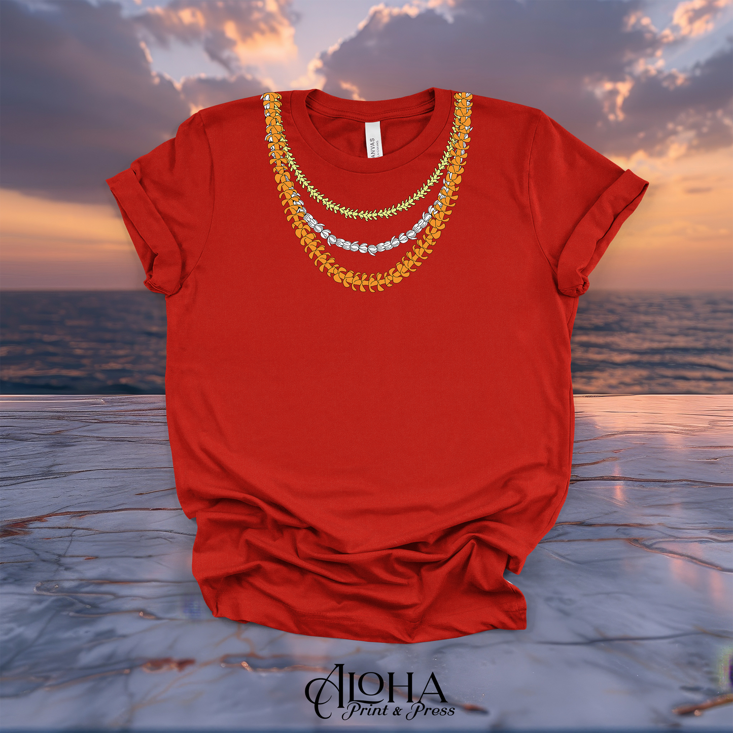 Bright red crewneck t-shirt featuring a detailed Hawaiian floral necklace graphic.