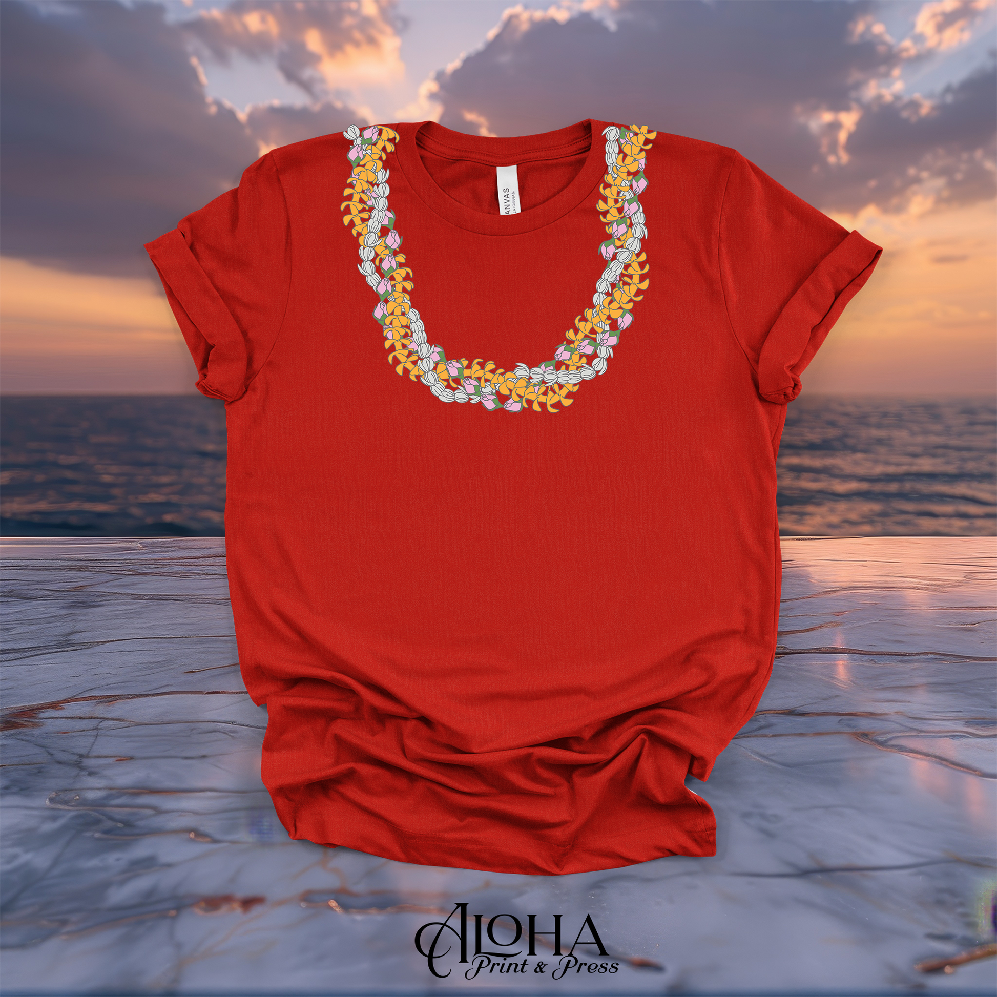 Bright red crewneck t-shirt featuring a vivid Hawaiian floral necklace graphic print.