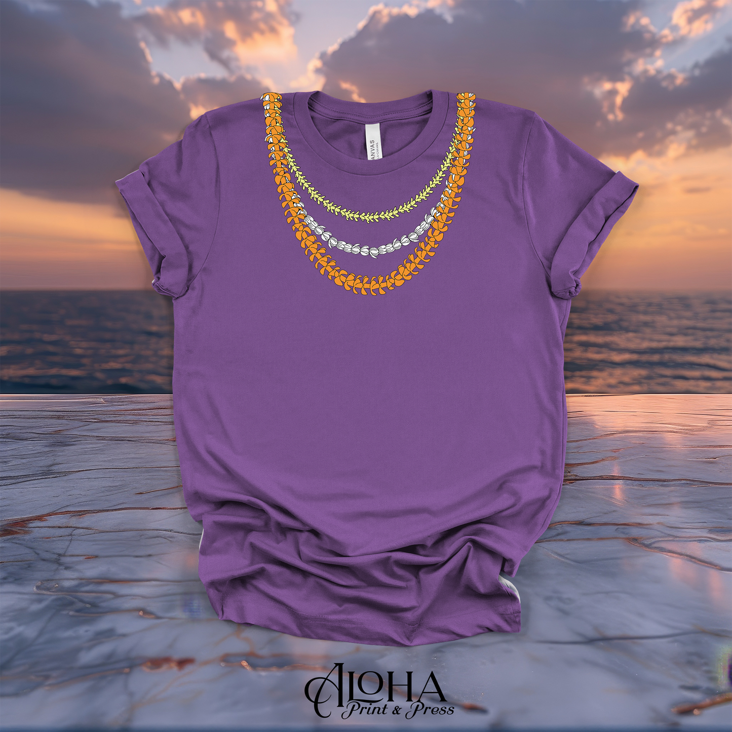 Royal Purple t-shirt with vibrant yellow green and white Hawaiian lei floral print.