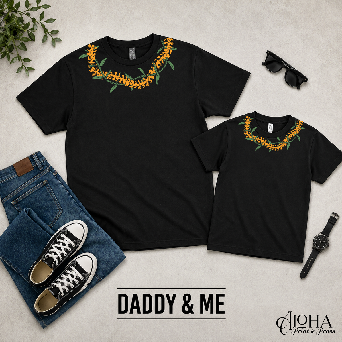 Ti Leaf and Puakenikeni Daddy and Me matching lei shirts in black