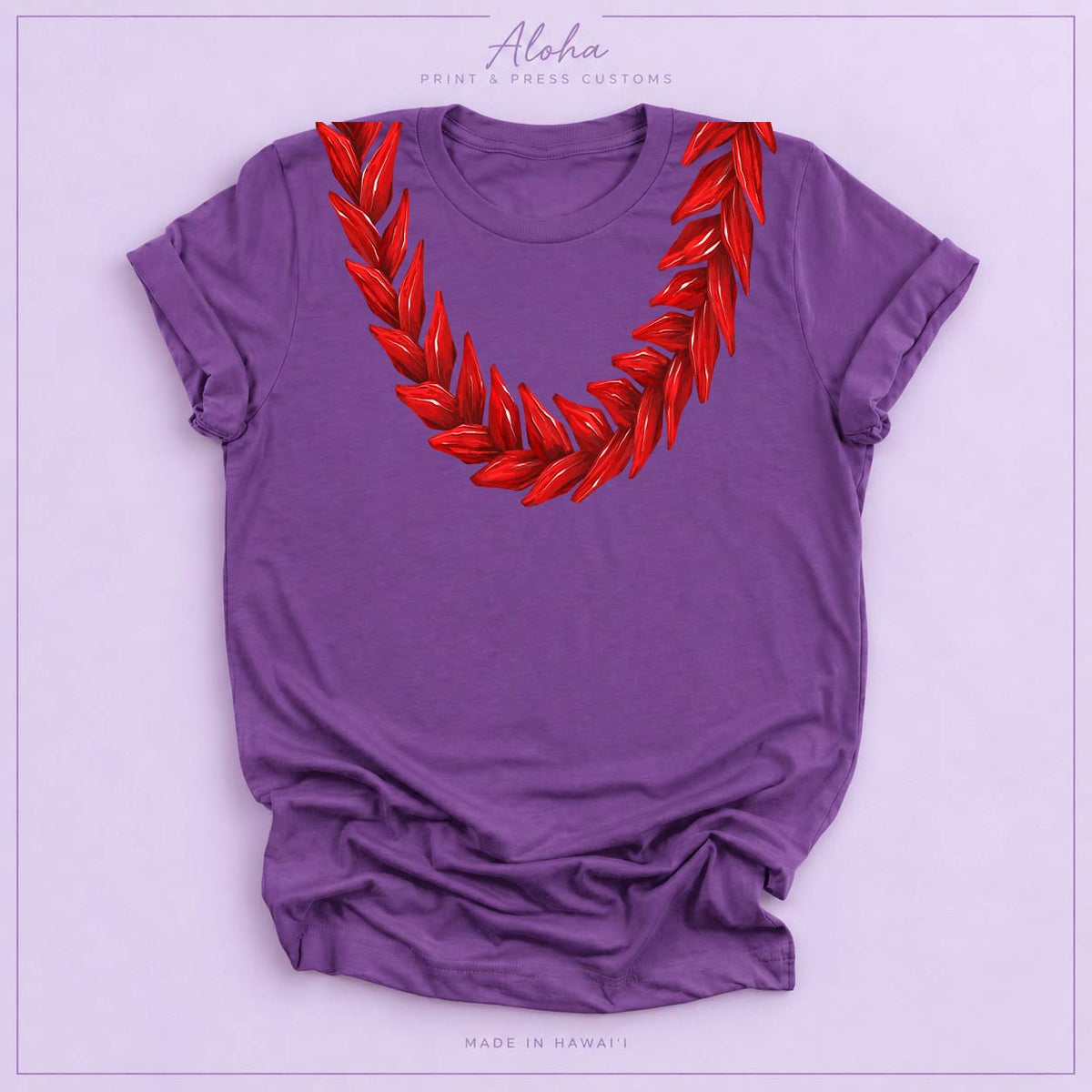 Royal purple T-shirt featuring a red Ula Fala-inspired lei design