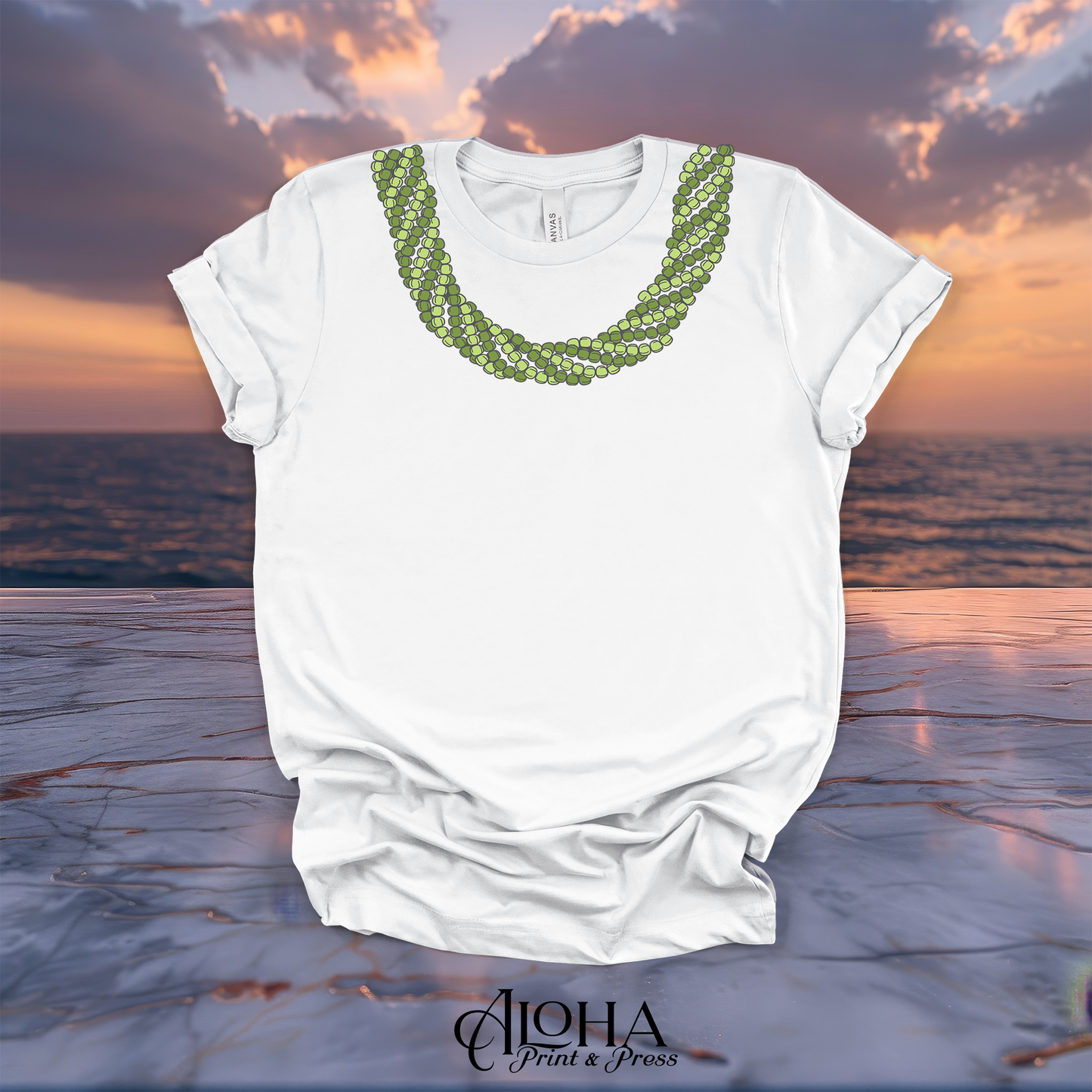 White Mokihana lei graphic T-shirt featuring a vibrant green Hawaiian lei neckline design
